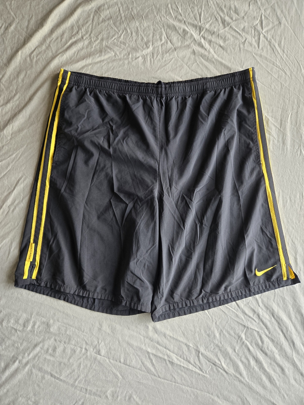 Nike Men's Black Athletic Shorts with Yellow Stripes - Size Lg